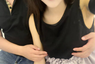 A stunningly beautiful young woman, her cousin, was being played with in a 3P encounter, moaning and whimpering as she was being fucked.